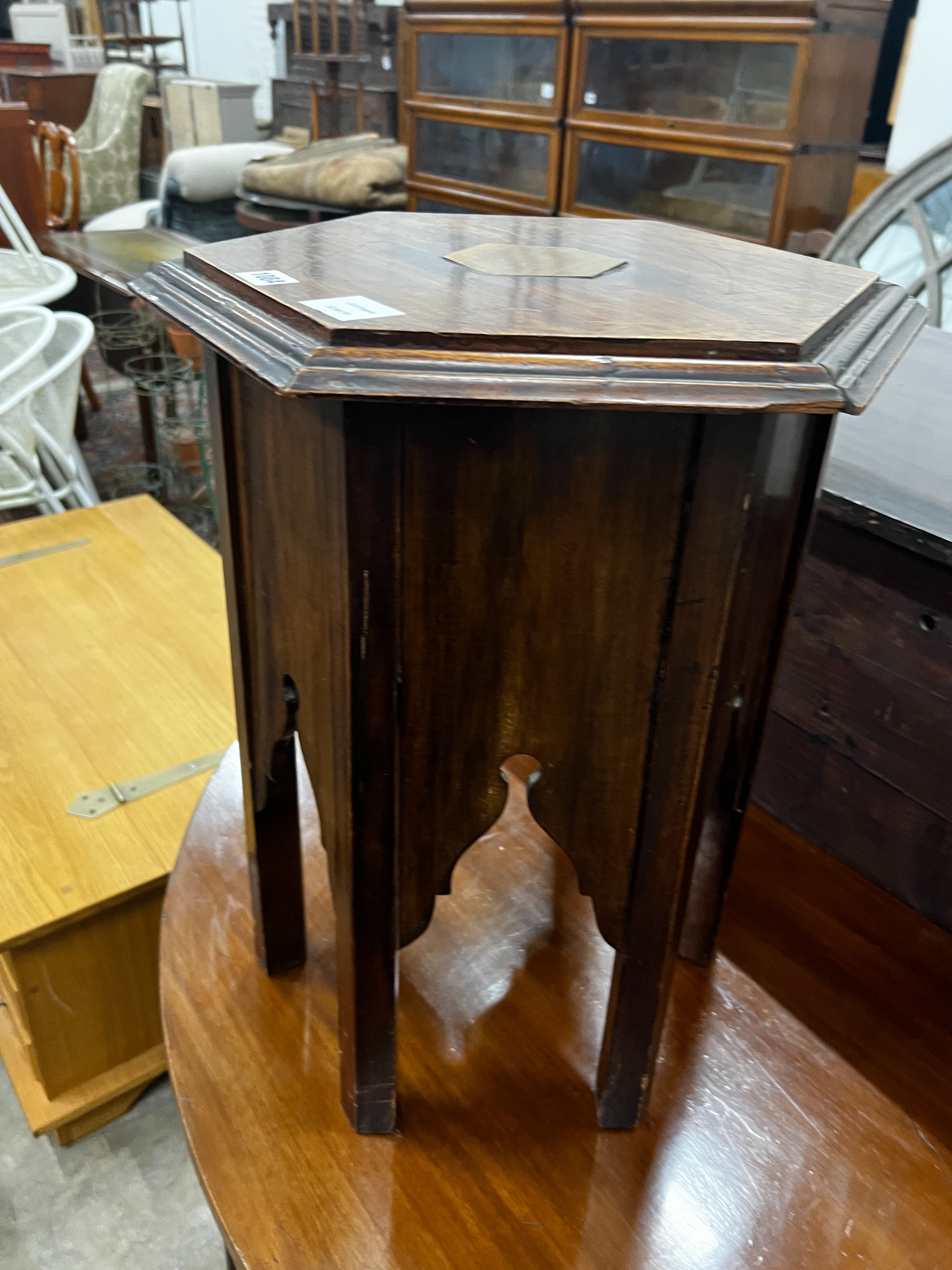 A Liberty style Moorish hexagonal hardwood occasional table, width 45cm, height 54cm